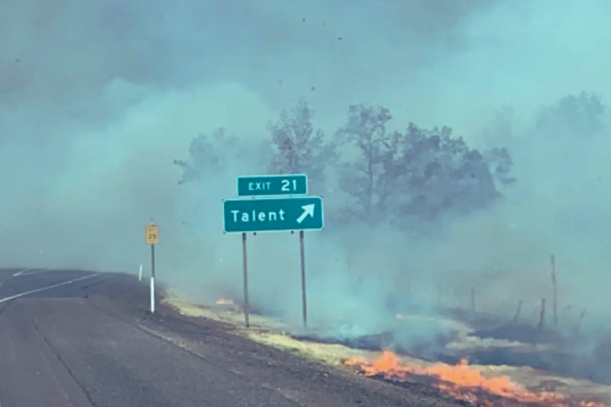 Exit 2` in Oregon while wildfire smoulders. 