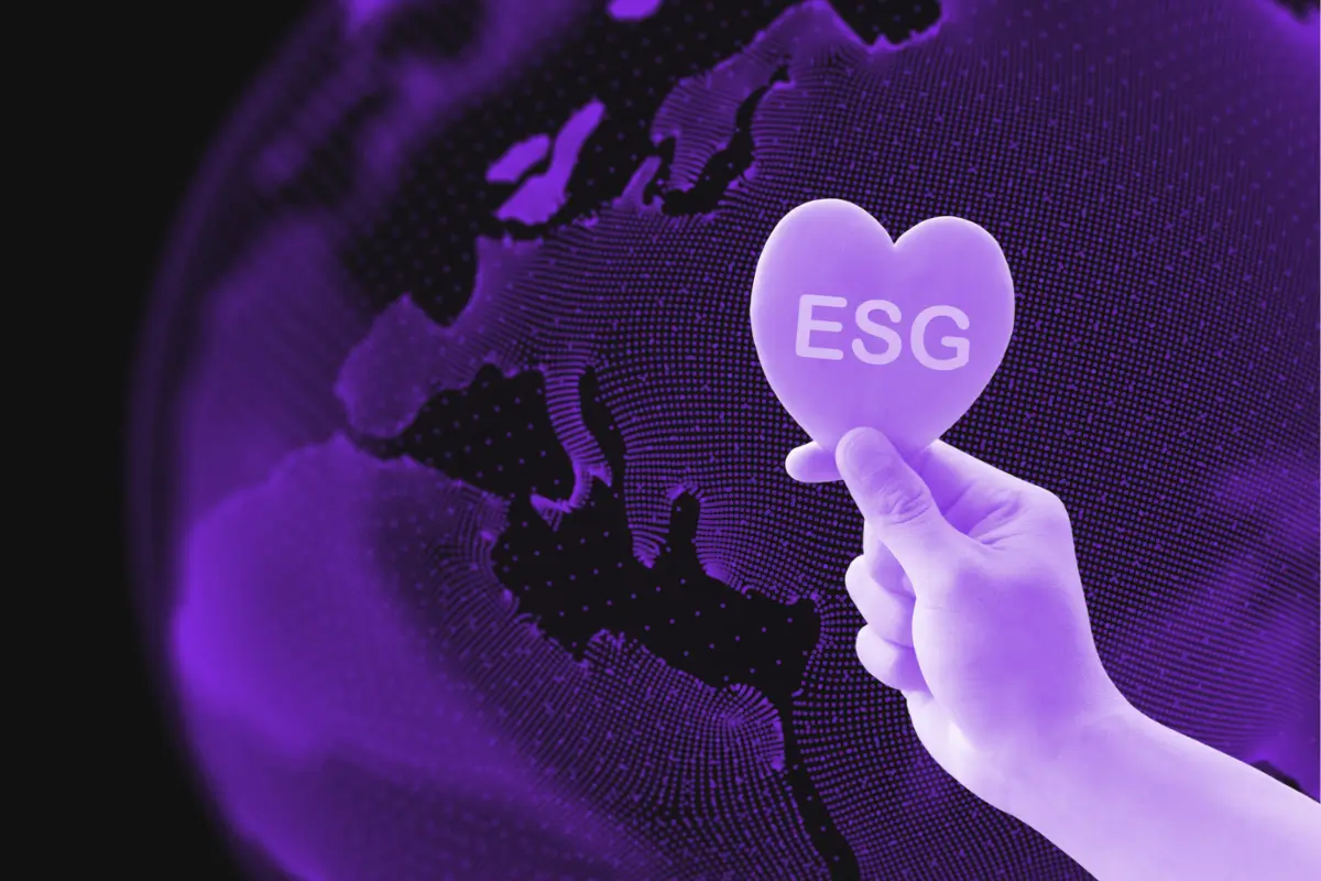 Image of earth with a hand holding a heart with the letters "E-S-G"